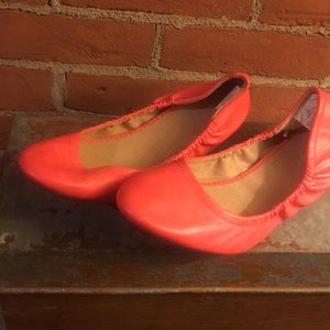 Salmon colored ballet flats, vinyl